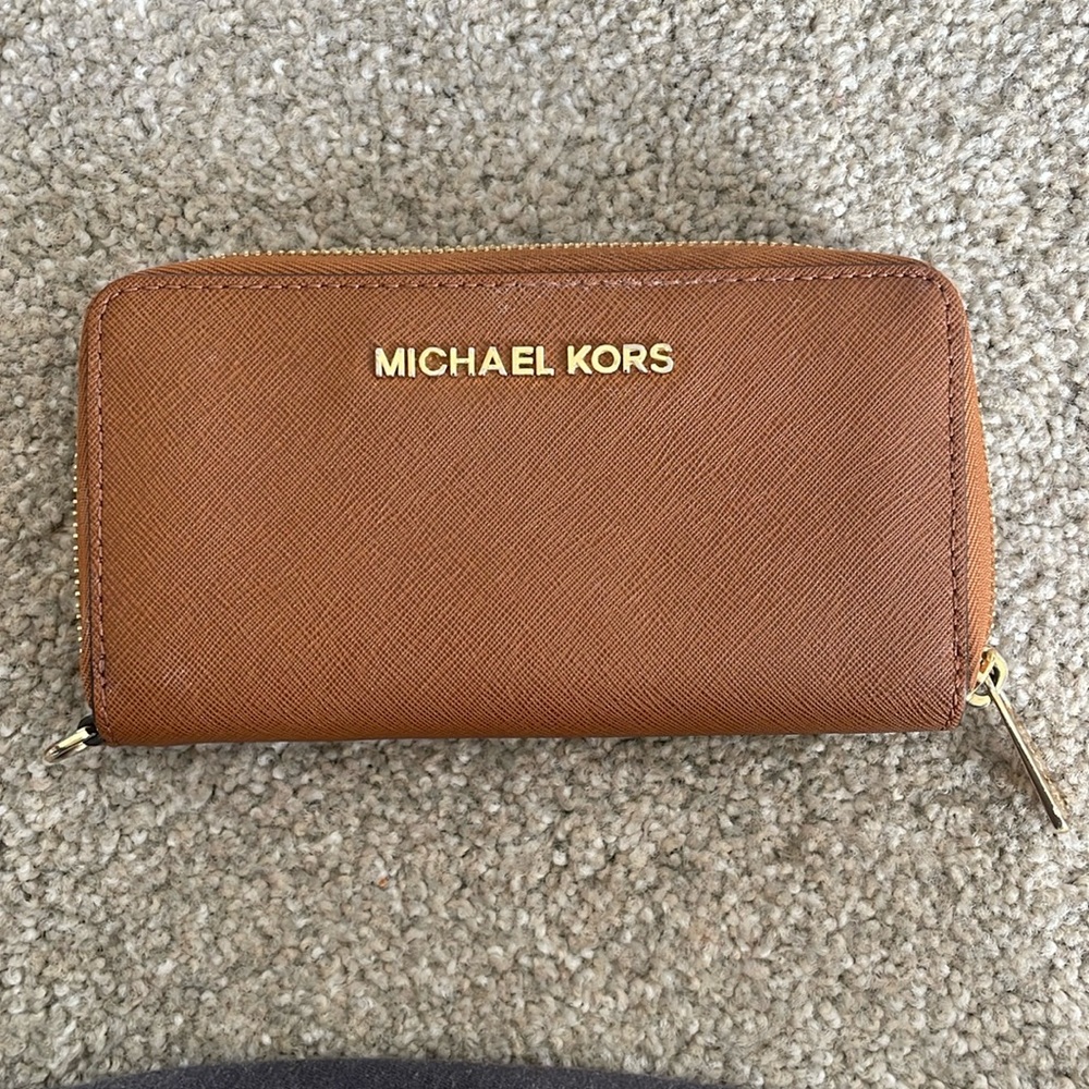 Michael Kor’s brown leather wallet